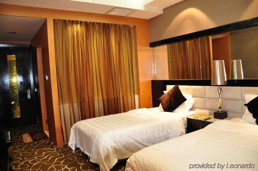Harbin Yakelai Holiday Hotel Номер фото